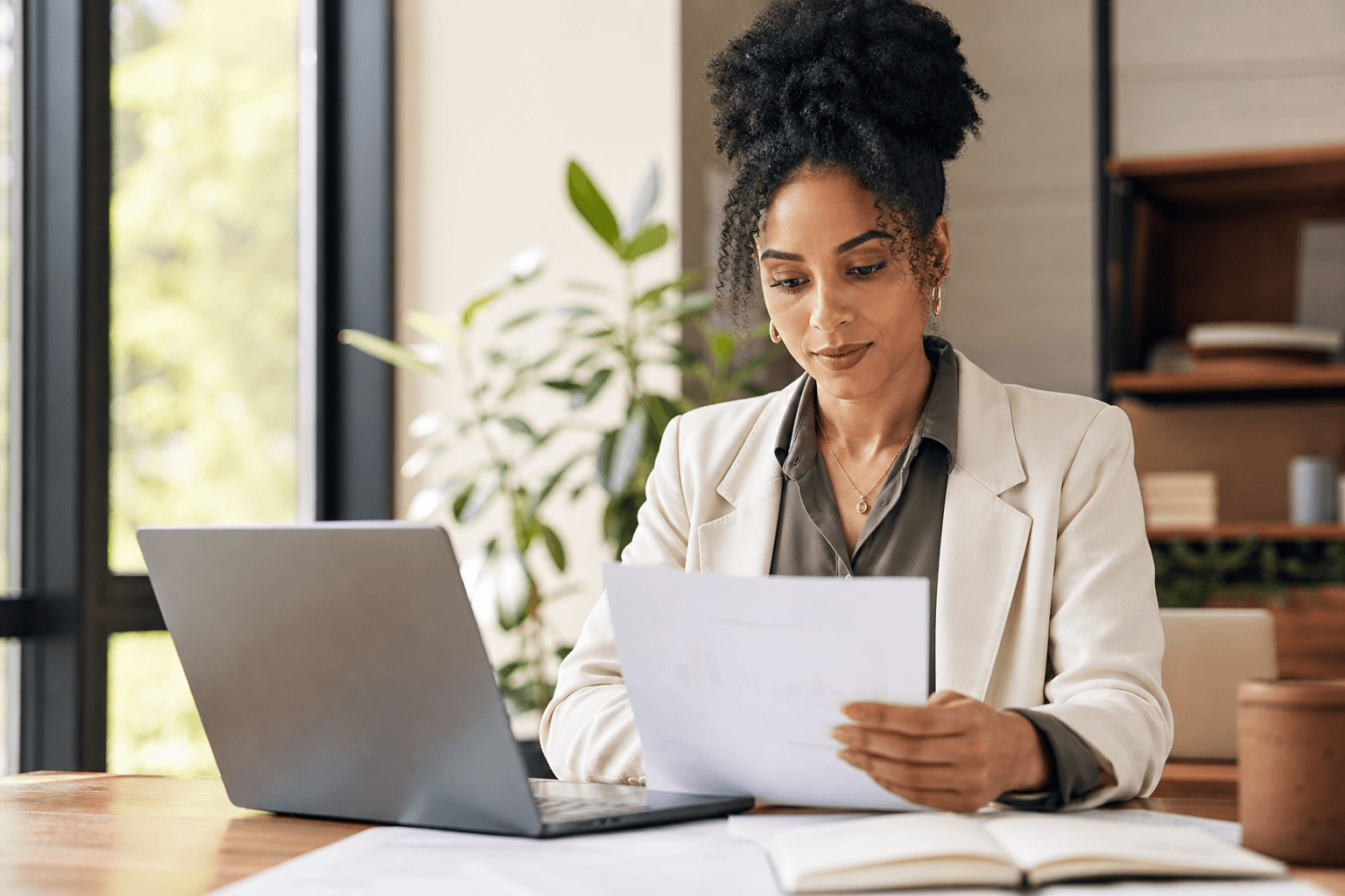 Professional reviewing POPIA compliance documents at a desk